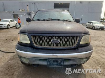 Piąte zdjęcie samochodu w środku: 2003 FORD F150 LARIAT VIN:1FTRX18L03NB95306 - miniatura