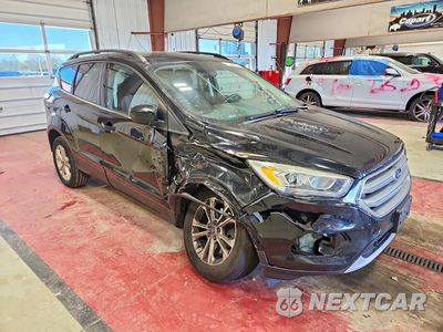 Czwarte zdjęcie samochodu z boku: 2017 FORD ESCAPE SE VIN:1FMCU9GDXHUC75115 - miniatura