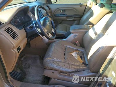 Zdjęcie 7 z 13 samochodu: 2004 HONDA PILOT EXL VIN:2HKYF18534H531953 - miniatura