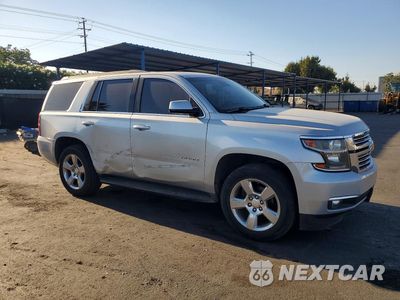 Czwarte zdjęcie samochodu z boku: 2015 CHEVROLET TAHOE C1500 LT VIN:1GNSCBKC1FR163531 - miniatura