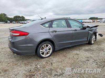 Trzecie zdjęcie samochodu z tyłu: 2018 FORD FUSION S HYBRID VIN:3FA6P0UU6JR142282 - miniatura