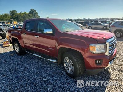 Czwarte zdjęcie samochodu z boku: 2017 GMC CANYON SLT VIN:1GTG5DEN1H1187606 - miniatura
