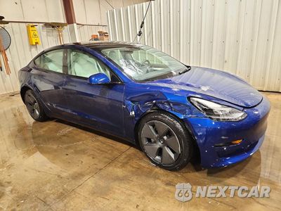 Czwarte zdjęcie samochodu z boku: 2023 TESLA MODEL 3 VIN:5YJ3E1EB6PF386742 - miniatura
