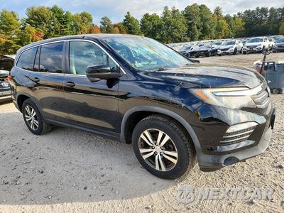 Czwarte zdjęcie samochodu z boku: 2016 HONDA PILOT EXL VIN:5FNYF6H5XGB061873 - miniatura