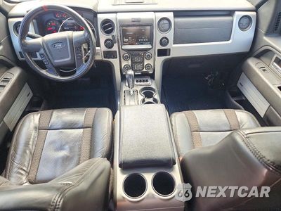 Zdjęcie 8 z 12 samochodu: 2014 FORD F150 SVT RAPTOR VIN:1FTFW1R66EFB98139 - miniatura