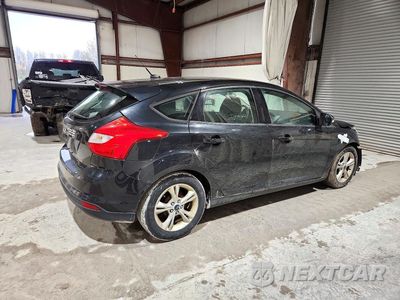Trzecie zdjęcie samochodu z tyłu: 2014 FORD FOCUS SE VIN:1FADP3K25EL307494 - miniatura