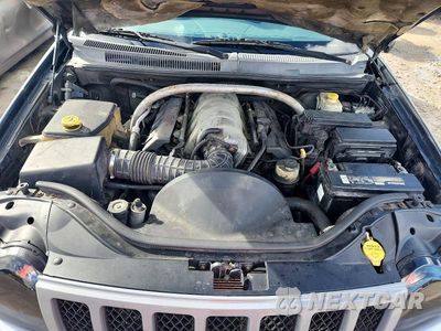 Zdjęcie 11 z 12 samochodu: 2006 JEEP GRAND CHEROKEE SRT-8 VIN:1J8HR78376C218114 - miniatura