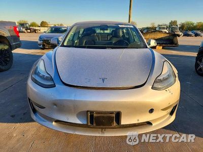 Piąte zdjęcie samochodu w środku: 2018 TESLA MODEL 3 VIN:5YJ3E1EA5JF058761 - miniatura