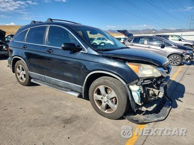 Czwarte zdjęcie samochodu z boku: 2010 HONDA CR-V EXL VIN:JHLRE4H75AC000225 - miniatura