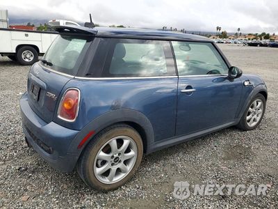 Trzecie zdjęcie samochodu z tyłu: 2010 MINI COOPER S VIN:WMWMF7C56ATZ34743 - miniatura