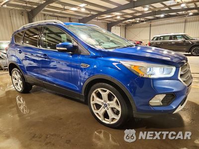Czwarte zdjęcie samochodu z boku: 2019 FORD ESCAPE TITANIUM VIN:1FMCU9J99KUC49200 - miniatura