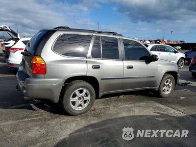 Trzecie zdjęcie samochodu z tyłu: 2009 GMC ENVOY SLE VIN:1GKDS33SX92127600 - miniatura