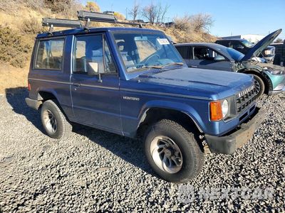 Czwarte zdjęcie samochodu z boku: 1989 MITSUBISHI MONTERO VIN:JA7FJ43E7KJ003753 - miniatura