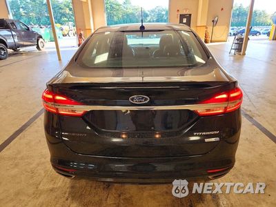 Zdjęcie 6 z 12 samochodu: 2017 FORD FUSION TITANIUM VIN:3FA6P0D94HR211007 - miniatura