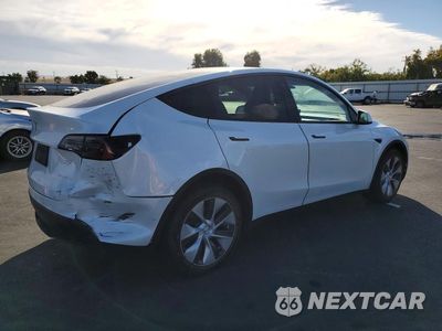 Trzecie zdjęcie samochodu z tyłu: 2022 TESLA MODEL Y VIN:7SAYGDEE7NF443655 - miniatura