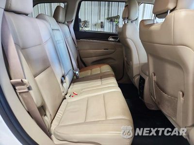 Zdjęcie 10 z 12 samochodu: 2014 JEEP GRAND CHEROKEE LIMITED VIN:1C4RJFBG9EC241255 - miniatura