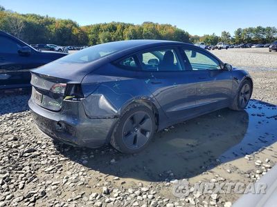 Trzecie zdjęcie samochodu z tyłu: 2023 TESLA MODEL 3 VIN:5YJ3E1EB8PF660023 - miniatura