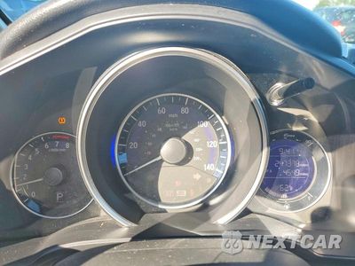 Zdjęcie 9 z 12 samochodu: 2017 HONDA FIT LX VIN:JHMGK5H51HS002215 - miniatura