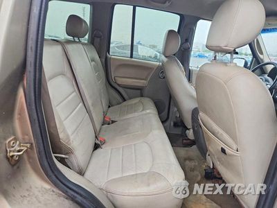 Zdjęcie 10 z 13 samochodu: 2003 JEEP LIBERTY LIMITED VIN:1J4GK58K43W619708 - miniatura