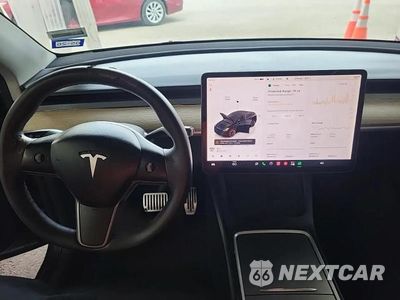 Zdjęcie 9 z 14 samochodu: 2022 TESLA MODEL Y VIN:7SAYGDEE1NF387017 - miniatura