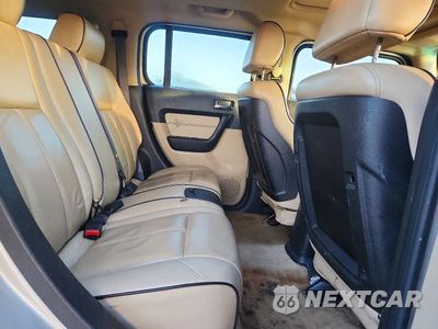 Zdjęcie 11 z 13 samochodu: 2006 HUMMER H3 VIN:5GTDN136968156324 - miniatura