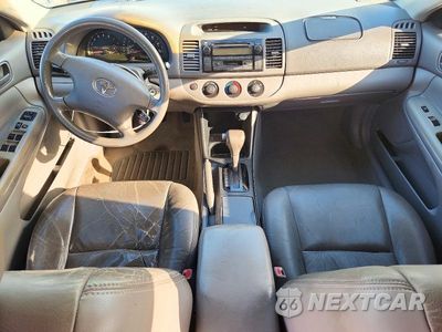 Zdjęcie 8 z 13 samochodu: 2003 TOYOTA CAMRY LE VIN:4T1BE32K43U788199 - miniatura