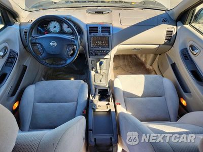Zdjęcie 8 z 13 samochodu: 2003 NISSAN MAXIMA GXE VIN:JN1DA31D43T525019 - miniatura