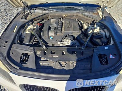 Zdjęcie 11 z 13 samochodu: 2012 BMW 740 LI VIN:WBAKB4C5XCC575918 - miniatura
