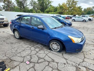 Czwarte zdjęcie samochodu z boku: 2009 FORD FOCUS SE VIN:1FAHP35NX9W101762 - miniatura