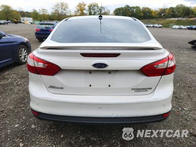 Zdjęcie 6 z 12 samochodu: 2013 FORD FOCUS TITANIUM VIN:1FADP3J20DL259936 - miniatura