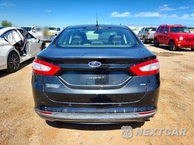 Zdjęcie 6 z 12 samochodu: 2014 FORD FUSION SE VIN:1FA6P0H71E5383406 - miniatura