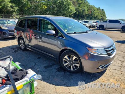 Czwarte zdjęcie samochodu z boku: 2014 HONDA ODYSSEY TOURING VIN:5FNRL5H93EB064069 - miniatura