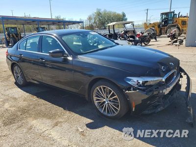 Czwarte zdjęcie samochodu z boku: 2019 BMW 530E VIN:WBAJA9C50KB393077 - miniatura