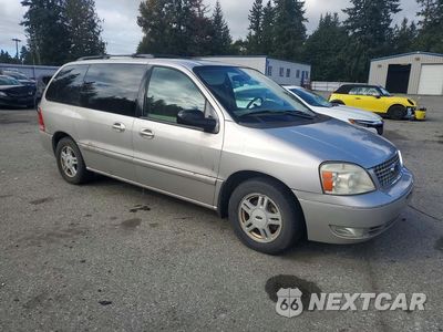Czwarte zdjęcie samochodu z boku: 2005 FORD FREESTAR SEL VIN:2FMZA52265BA92586 - miniatura
