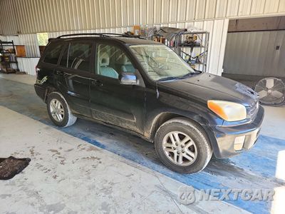 Czwarte zdjęcie samochodu z boku: 2003 TOYOTA RAV4 BASE VIN:JTEGH20VX30110892 - miniatura