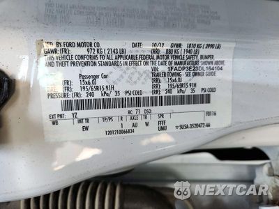 Zdjęcie 12 z 12 samochodu: 2013 FORD FOCUS S VIN:1FADP3E23DL164104 - miniatura