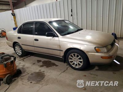 Czwarte zdjęcie samochodu z boku: 1995 TOYOTA COROLLA DX VIN:2T1AE09BXSC108807 - miniatura