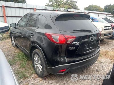 Trzecie zdjęcie samochodu z tyłu: 2014 MAZDA CX-5 TOURING VIN:JM3KE4CYXE0402321 - miniatura