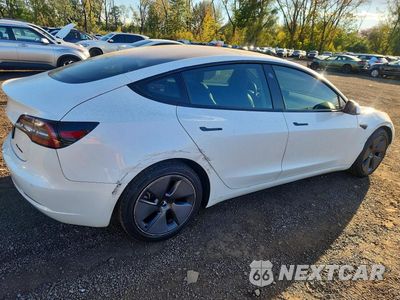 Trzecie zdjęcie samochodu z tyłu: 2021 TESLA MODEL 3 VIN:5YJ3E1EB6MF915036 - miniatura