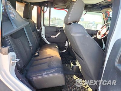 Zdjęcie 10 z 12 samochodu: 2016 JEEP WRANGLER UNLIMITED SAHARA VIN:1C4BJWEG0GL103765 - miniatura