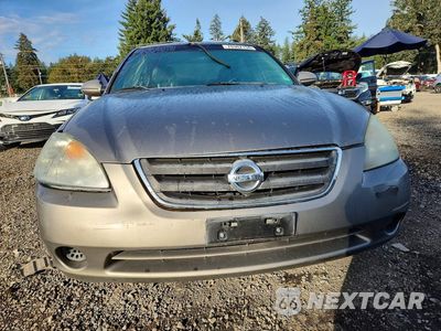 Piąte zdjęcie samochodu w środku: 2002 NISSAN ALTIMA 2.5 VIN:1N4AL11D22C291935 - miniatura