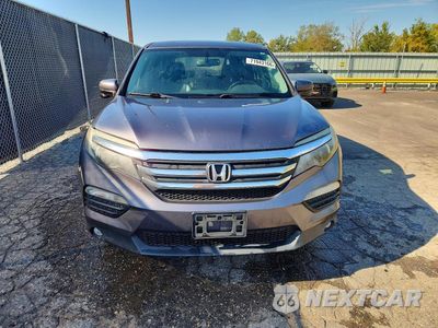 Piąte zdjęcie samochodu w środku: 2017 HONDA PILOT EXLN VIN:5FNYF6H72HB027204 - miniatura
