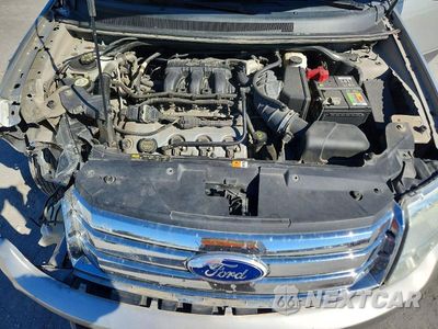Zdjęcie 12 z 13 samochodu: 2008 FORD TAURUS X SEL VIN:1FMDK02W88GA12702 - miniatura