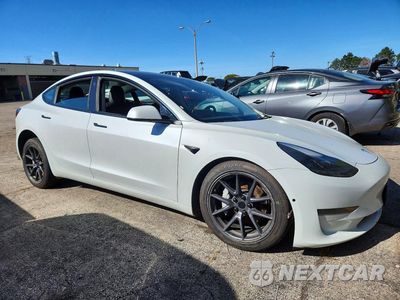 Czwarte zdjęcie samochodu z boku: 2022 TESLA MODEL 3 VIN:5YJ3E1EA9NF369132 - miniatura