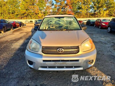 Piąte zdjęcie samochodu w środku: 2004 TOYOTA RAV4 BASE VIN:JTEHD20V140013663 - miniatura