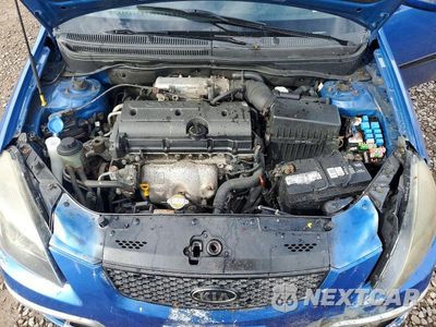 Zdjęcie 11 z 12 samochodu: 2010 KIA RIO BASE VIN:KNADH4A36A6667371 - miniatura