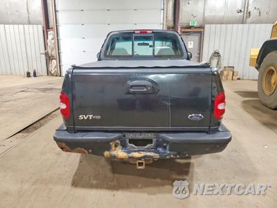 Zdjęcie 6 z 12 samochodu: 1999 FORD F150 SVT LIGHTNING VIN:2FTZF0733XCB06757 - miniatura