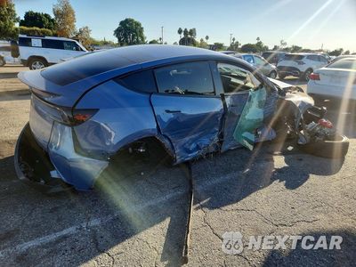 Trzecie zdjęcie samochodu z tyłu: 2026 TESLA MODEL Y VIN:7SAYGDET8TA729331 - miniatura