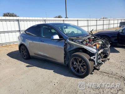 Czwarte zdjęcie samochodu z boku: 2024 TESLA MODEL Y VIN:7SAYGDED7RF211585 - miniatura