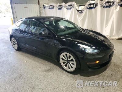 Czwarte zdjęcie samochodu z boku: 2023 TESLA MODEL 3 VIN:5YJ3E1EA5PF430351 - miniatura